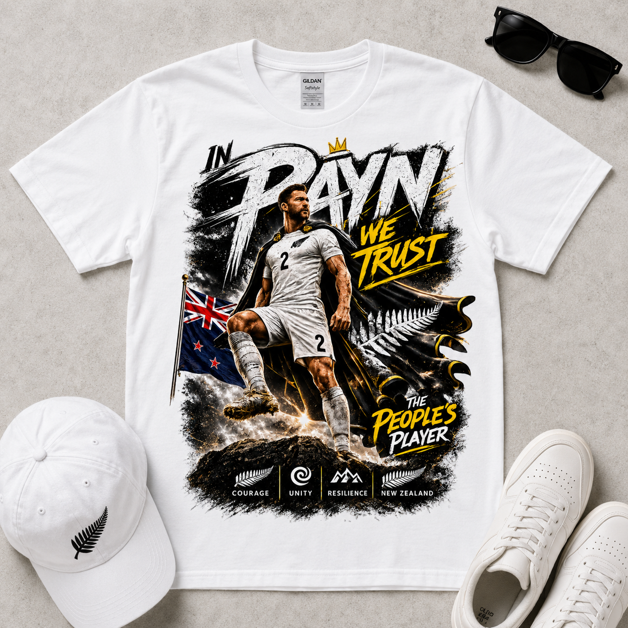 white Tim Payne World Cup 2026 supporter tee flat lay featuring exclusive New Zealand In Payne We Trust football design
